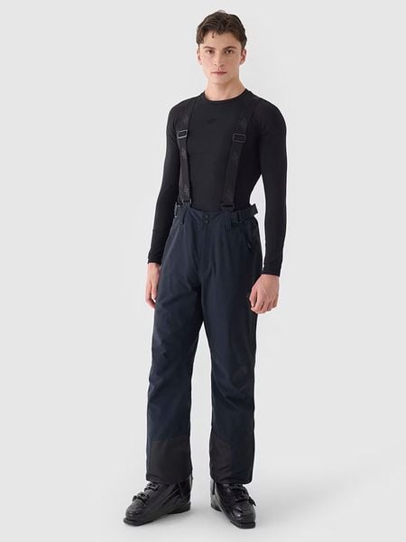 4F Spodnie narciarskie w kolorze granatowym rozmiar: L. Niebieskie spodnie materiałowe męskie 4f, bez wzorów. Za 335.02 zł.