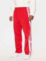 Adidas Spodnie dresowe Adibreak JP3765 Czerwony Regular Fit. Czerwone spodnie dresowe męskie Adidas, bez wzorów, z dresówki. Za 249.99 zł.