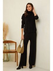 Soft Cashmere Spodnie w kolorze czarnym rozmiar: 38/40. Czarne spodnie materiałowe damskie Soft Cashmere, bez wzorów, z kaszmiru. Za 130.99 zł.