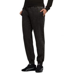 Spodnie damskie Puma ESS Elevated Comfort Wash Sweatpants 01. Czarne spodnie dresowe damskie Puma, bez wzorów. Za 182.99 zł.