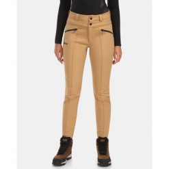 Spodnie softshell damskie Kilpi MAURA-W. Brązowe spodnie dresowe damskie Kilpi, na zimę, bez wzorów, z softshellu. Za 566.65 zł.