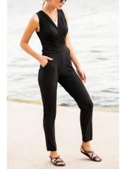 Milan Kiss Kombinezon w kolorze czarnym rozmiar: L. Czarne kombinezony damskie Milan Kiss, l, bez wzorów, bez kołnierzyka, bez ramiączek. Za 152.99 zł.