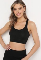 Czarny Biustonosz Top Sportowy z Elastycznego Materiału Revettia. Czarne biustonosze sportowe damskie Born2be, m, bez wzorów, bez ramiączek. Za 29.99 zł.