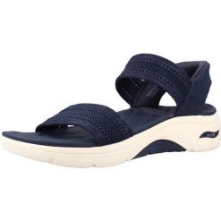 Sandały SKECHERS 140844S Niebieski. Niebieskie sandały damskie Skechers, bez wzorów, z tkaniny, bez obcasa. Za 278.99 zł.