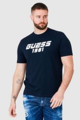 GUESS Granatowy t-shirt męski z odblaskowym logo. Niebieskie t-shirty męskie Guess, m, z aplikacjami, bez kołnierzyka. W wyprzedaży za 119.99 zł.