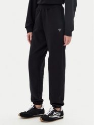 Guess Spodnie dresowe V5YB17 KCRP0 Czarny Regular Fit. Czarne spodnie dresowe damskie Guess, s, z aplikacjami, z bawełny. Za 229.99 zł.