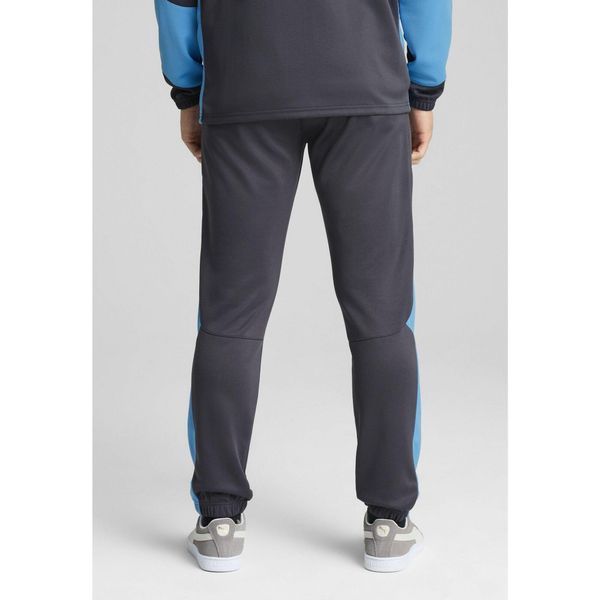 Męskie spodnie Olympique de Marseille ftblNRGY+ PUMA. Brązowe spodnie dresowe męskie Puma, bez wzorów, sportowe. W wyprzedaży za 228.30 zł.