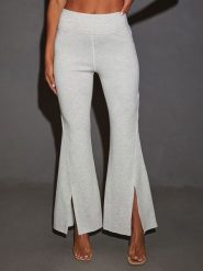 Milan Kiss Spodnie w kolorze jasnoszarym rozmiar: M. Szare spodnie materiałowe damskie Milan Kiss, bez wzorów, z materiału. Za 130.99 zł.