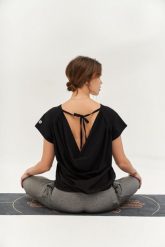 Top do jogi Moonholi Gravity Wave Top z wiązaniem na plecach. Czarne topy sportowe damskie MOONHOLI, xs, bez wzorów, z bawełny, bez ramiączek. Za 299.00 zł.