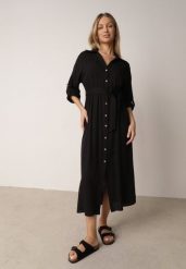 Czarna Bawełniana Sukienka Koszulowa z Paskiem i Regulowanymi Rękawami Sadevia. Czarne sukienki damskie Born2be, do pracy, l, bez wzorów, z bawełny, biznesowe, bez kołnierzyka, bez ramiączek, maxi, koszulowe. Za 119.99 zł.