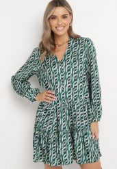 Zielona Rozkloszowana Sukienka Mini z Falbanką Naike. Zielone sukienki damskie Born2be, l, z aplikacjami, z tkaniny, bez kołnierzyka, bez ramiączek, mini, rozkloszowane. W wyprzedaży za 111.99 zł.
