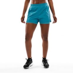 Damskie spodenki treningowe 2 w 1 Fitness Siroko Gili. Niebieskie spodenki sportowe damskie SIROKO, bez wzorów, z materiału. Za 127.00 zł.