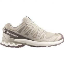 Buty do biegania męskie Salomon L49153800000. Brązowe obuwie do biegania damskie Salomon. Za 928.00 zł.