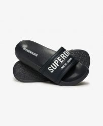 Superdry City Luxe Pool Sliders - Klapki z wyściełanym paskiem – EBONY. Brązowe klapki damskie Superdry., z poliesteru. Za 147.40 zł.