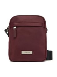 Calvin Klein Saszetka Sleek Reporter LV04D3180G Bordowy. Czerwone saszetki męskie CALVIN KLEIN, z materiału. Za 299.99 zł.