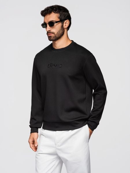 Męska bluza regular z błyszczącym printem na klatce piersiowej - czarna V1. Czarne bluzy bez kaptura męskie Ombre Clothing, m, z dzianiny. W wyprzedaży za 132.99 zł.
