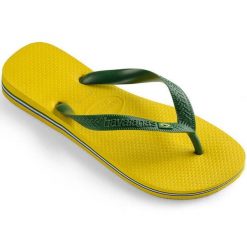 Japonki damskie Havaianas Brasil Citrus Yellow 4000032-2197. Żółte klapki damskie Havaianas, bez wzorów, z materiału, bez obcasa. Za 89.00 zł.