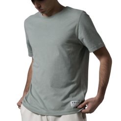 T-shirt Casual Vert. Zielone t-shirty męskie VOLT PADEL, uniwersalny, bez wzorów, z bawełny, bez kołnierzyka. Za 207.35 zł.