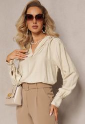 Jasnobeżowa Bluzka z Bufiastymi Rękawami i Trójkątnym Dekoltem Hilko. Brązowe bluzki damskie Renee, s, bez wzorów, z wiskozy, eleganckie, bez kołnierzyka, bez ramiączek. Za 24.99 zł.