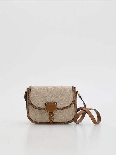 Żakardowa torebka na ramię - brązowy. Brązowe torebki klasyczne damskie Reserved, bez wzorów, z bawełny, bez dodatków. Za 139.99 zł.