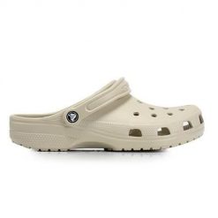 Klapki dla dorosłych Crocs Classic. Brązowe klapki damskie Crocs, bez wzorów, z materiału, bez obcasa. Za 268.00 zł.