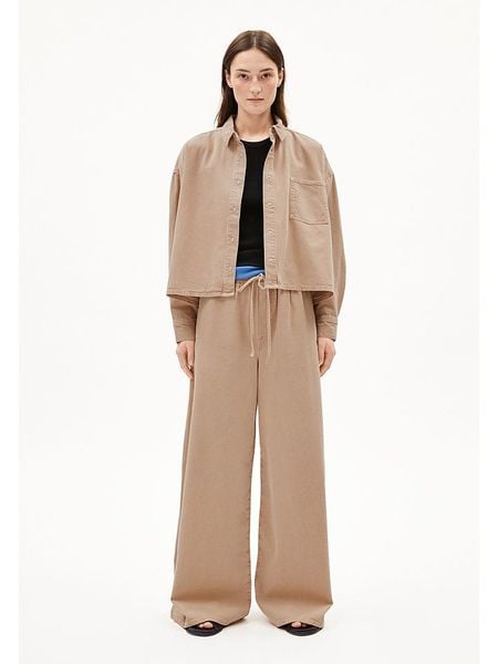 Armedangels Spodnie "Kelaani" w kolorze jasnobrązowym rozmiar: XS. Brązowe spodnie materiałowe damskie ARMEDANGELS, bez wzorów, z bawełny, z podwyższonym stanem. Za 243.84 zł.