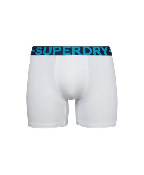 Superdry Boxer Triple Pack z bawełny organicznej i elastanu. Niebieskie bokserki męskie Superdry., bez wzorów, z bawełny. Za 198.35 zł.