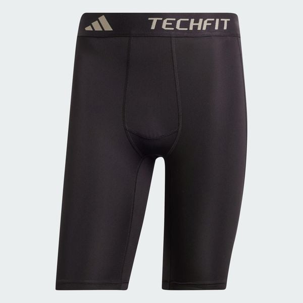 Krótkie kompresyjne legginsy treningowe TECHFIT. Szare spodnie sportowe męskie Adidas, z elastanu. Za 129.00 zł.