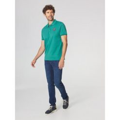 Koszulka polo męska TBS Voldapol. Zielone koszulki polo męskie Tbs, m, bez wzorów, bez ramiączek. Za 319.00 zł.
