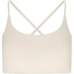 Athlecia Biustonosz sportowy Emarri z poliamidu i elastanu – 1207 Vaporous Gray. Szare biustonosze sportowe damskie Athlecia, bez wzorów, z elastanu. Za 137.00 zł.