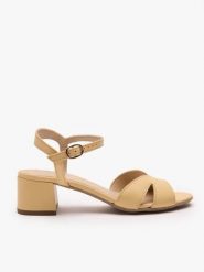 Jasnożółte sandały na obcasie. Żółte sandały damskie Ryłko, bez wzorów, ze skóry, bez obcasa, na obcasie. Za 399.99 zł.