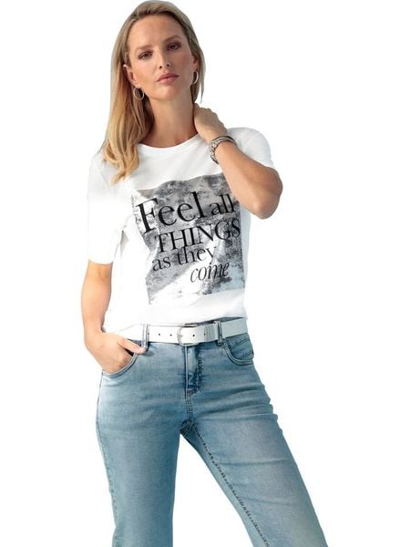 Heine Koszulka w kolorze białym rozmiar: 40. Białe bluzki damskie Heine, bez wzorów, bez kołnierzyka, bez ramiączek. Za 68.95 zł.