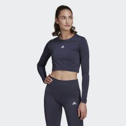 Koszulka damska adidas Aeroknit Seamless Fitted Cropped. Białe bluzki sportowe damskie Adidas, s, bez wzorów, z materiału, bez ramiączek. Za 102.00 zł.