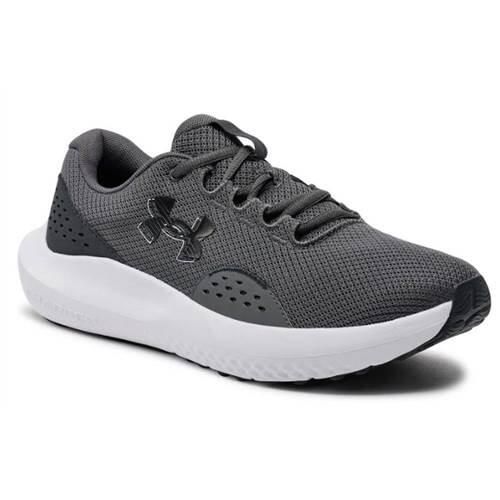 Buty do biegania męskie Under Armour Charged Surge 4. Szare obuwie do biegania damskie Under Armour. Za 211.99 zł.