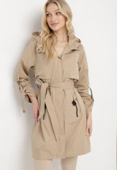 Beżowa Kurtka Parka z Kieszeniami i Materiałowym Paskiem Bricketta. Brązowe kurtki damskie Born2be, uniwersalny, bez wzorów, z materiału. Za 169.99 zł.