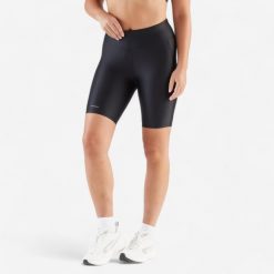 Legginsy do biegania krótkie damskie Kiprun Run 100 Comfort. Czarne legginsy damskie KALENJI, m, bez wzorów, z elastanu. Za 39.99 zł.