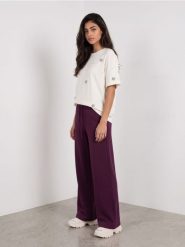 Spodnie wide leg z domieszką wiskozy - różowy. Czerwone spodnie materiałowe damskie Sinsay, bez wzorów, z wiskozy, sportowe. Za 49.99 zł.
