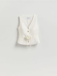 Kamizelka z lyocellem - złamana biel. Kamizelki damskie Reserved, l, z lyocellu. Za 159.99 zł.