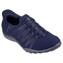 Damskie BREATHE-EASY ROLL-WITH-ME Slip-On Granatowy. Niebieskie trampki i tenisówki damskie Skechers, bez wzorów, z dzianiny. Za 379.99 zł.