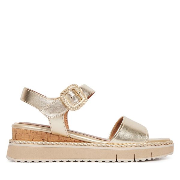 Sandały Tamaris. Żółte sandały damskie Tamaris, bez wzorów, bez obcasa, na koturnie. Za 369.99 zł.