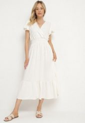 Jasnobeżowa Sukienka o Rozkloszowanym Kroju z Kopertowym Dekoltem i Gumką w Talii Reiliana. Brązowe sukienki damskie Born2be, na co dzień, l, bez wzorów, eleganckie, bez kołnierzyka, bez ramiączek, midi, kopertowe. Za 69.99 zł.