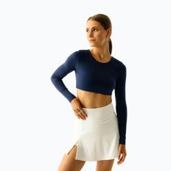 Top do jogi damski JoyInMe Core Crop Top. Niebieskie topy sportowe damskie Joy in me, bez wzorów, z elastanu, bez ramiączek. Za 299.99 zł.