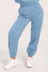 Spodnie fitness damskie Gym Glamour dresowe. Niebieskie spodnie sportowe damskie GYM GLAMOUR, s, z bawełny, na fitness i siłownię. Za 189.99 zł.