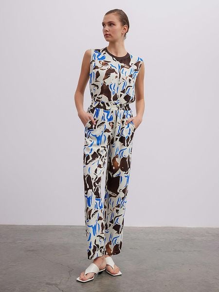 BGN Spodnie w kolorze brązowo-kremowym rozmiar: 34. Brązowe spodnie materiałowe damskie BGN, bez wzorów, z materiału, z podwyższonym stanem. Za 56.79 zł.