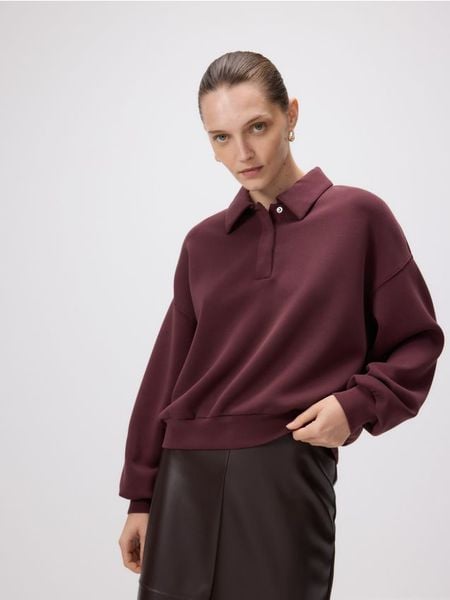 Bluza polo z modalem - bordowy. Czerwone bluzy bez kaptura damskie Reserved, l, z dzianiny. W wyprzedaży za 69.99 zł.