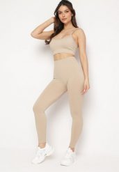 Beżowy Komplet Sportowy Biustonosz na Ramiączkach i Legginsy z Gumką w Pasie Nadlira. Brązowe biustonosze sportowe damskie Born2be, bez wzorów. Za 79.99 zł.