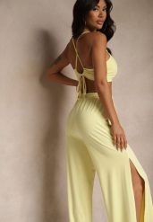 Żółty Komplet z Wiskozą Wiązany Top i Spodnie o Szerokim Kroju z Rozcięciami Zilavira. Żółte spodnie materiałowe damskie Renee, bez wzorów, z wiskozy, eleganckie. Za 89.99 zł.