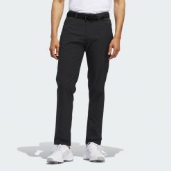 Spodnie Ultimate365 5-Pocket. Czarne spodnie materiałowe męskie Adidas, bez wzorów, sportowe. Za 369.00 zł.