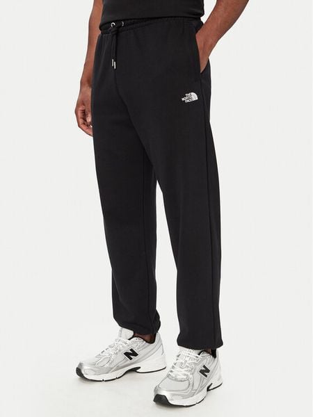 The North Face Spodnie dresowe TNF™ Essential Terry Simple Dome NF0A8FDF Czarny Regular Fit. Czarne spodnie dresowe męskie The North Face, bez wzorów, z dresówki. Za 349.99 zł.