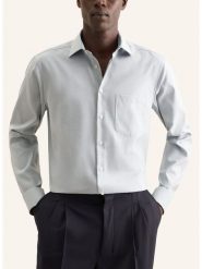 Seidensticker Koszula w kolorze zielonym rozmiar: 44. Zielone koszule męskie Seidensticker, bez wzorów, z bawełny, bez kołnierzyka, bez ramiączek. Za 109.52 zł.